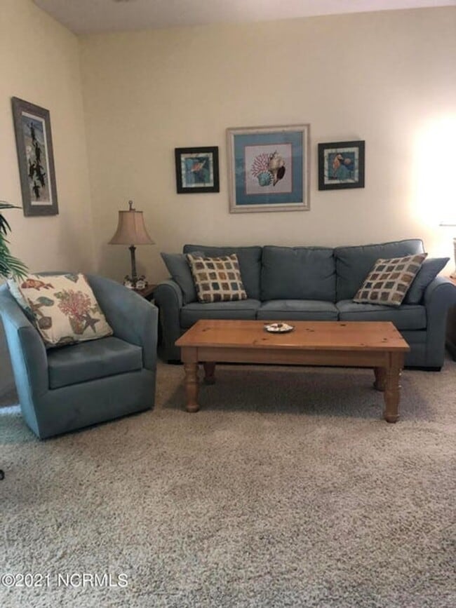 Building Photo - FULLY FURNISHED CONDO in sought-after Sea Trail subdivision!