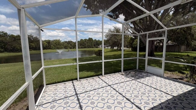 Building Photo - "Stunning 4-Bedroom Lake View Home in Oviedo – Spacious 2,132 Sq Ft Retreat!"