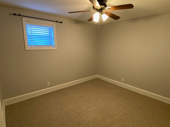 Second bedroom with southern exposure window - 225 N Franklin St