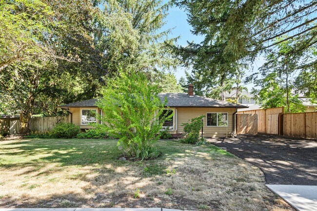 Building Photo - Charming, retro 2-bdrm/2-bath ranch in tranquil setting w/ large family room