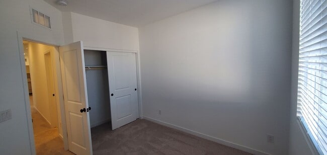 Building Photo - Beautifully designed modern townhome with attached garage.