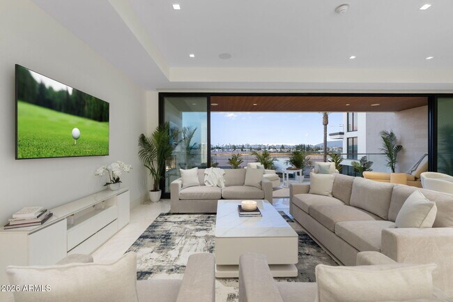 Building Photo - 6587 N Palmeraie Blvd