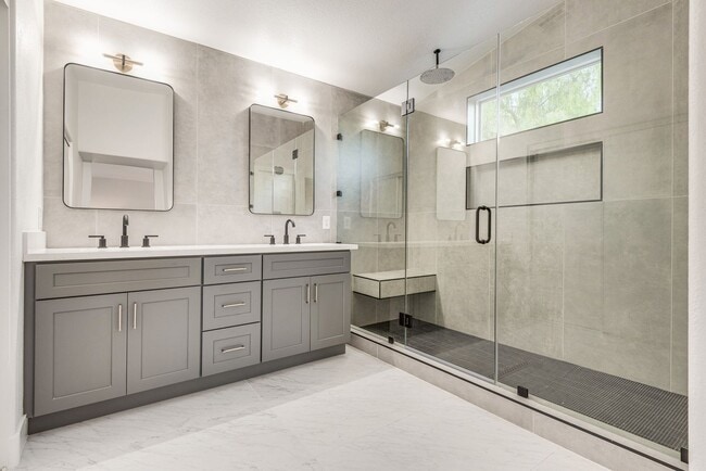 Building Photo - FULLY FURNISHED! Exudes sophistication with designer touches throughout