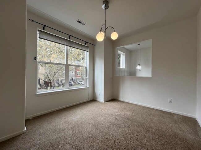 Building Photo - Beautiful 2 Bedroom Townhome with Walk-In Closets Private Deck & Attached Garage