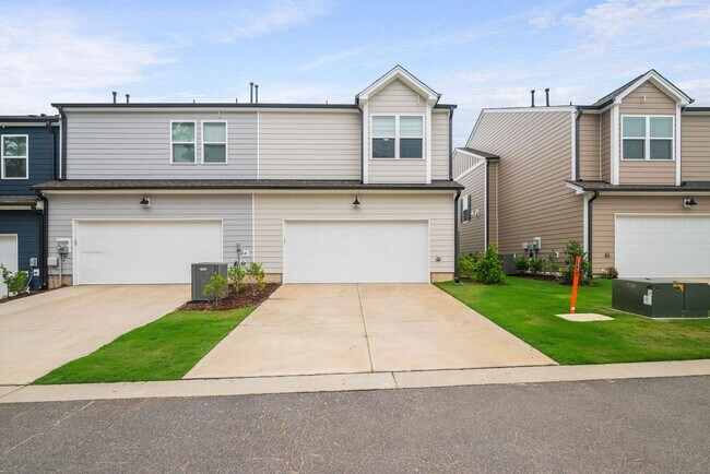 Building Photo - Stunning 3BD, 2.5BA End-Unit Fuquay-Varina Townhome with a 2-Car Garage in a Prime Location Near ...