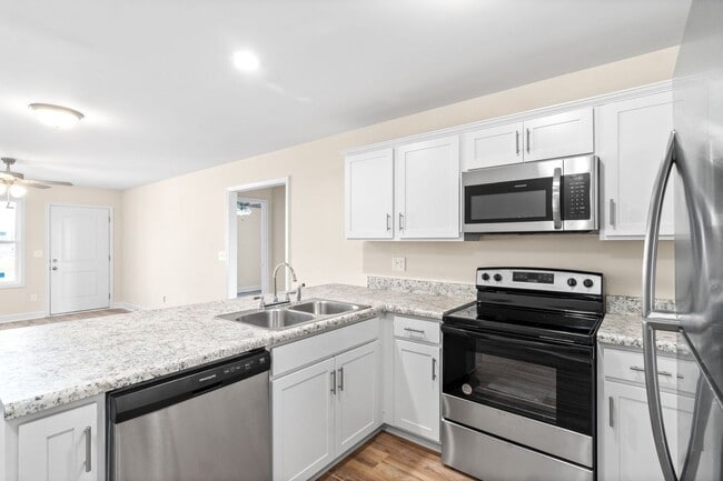 Building Photo - Move-in Special - TWO WEEKS FREE!!