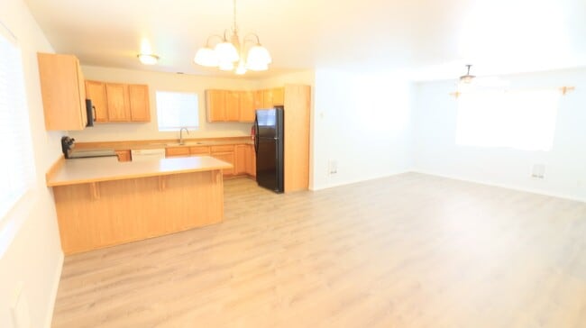 Building Photo - Recently updated 2/1.5 townhome next to th...