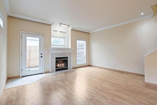 Building Photo - $500 move-in special! Unique 2-bdrm/2.5-bath duplex w/ A/C—Private patio, storage, garage w/ wash...