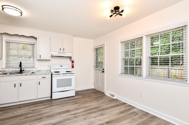 Building Photo - Tour Today! Beautiful redesigned corner co...