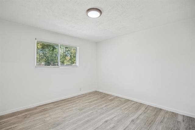 Building Photo - 303 N Delphine St