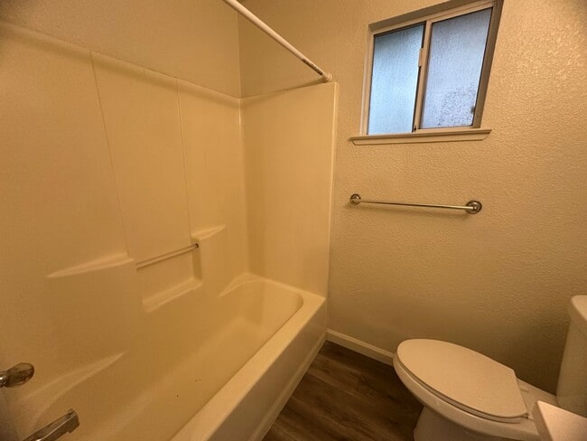 Building Photo - Three Bedroom 2 Bathoom with Large Yard