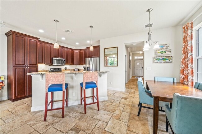 Building Photo - Coastal Living with Marina Views in Cape Crossing