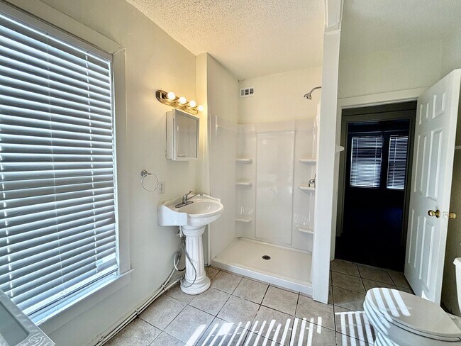 Building Photo - 3810-3812 Central St.