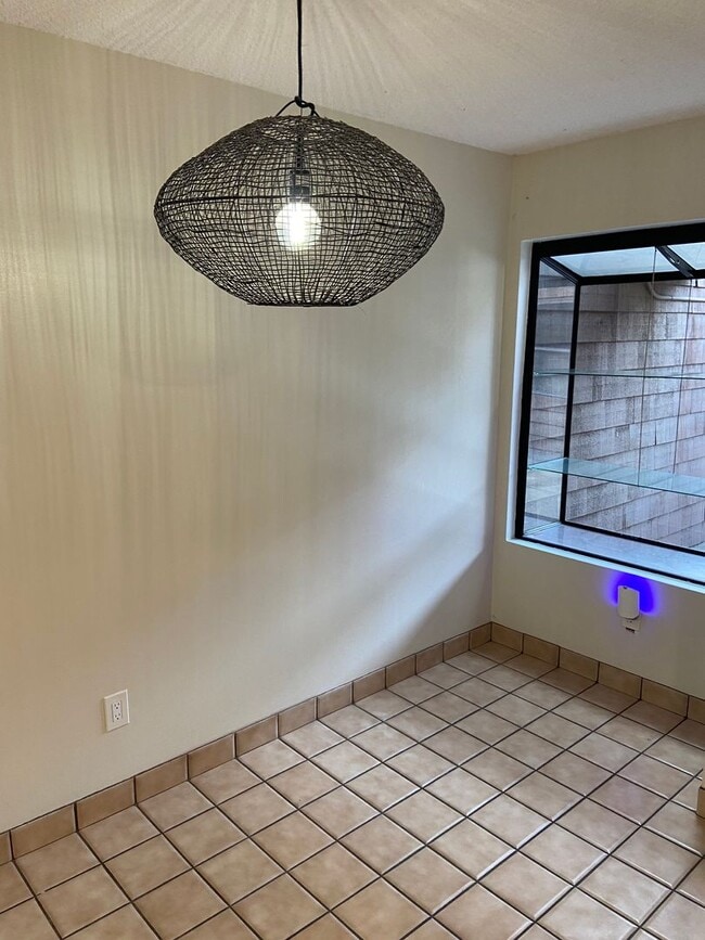 Building Photo - Charming 2-Bedroom, 2-Bathroom Townhome with Loft With Solar!