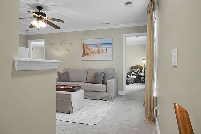 Building Photo - Johns Island 4BR, 2.5 BA Gem: Features Wood Floors, 2-Car Garage, & Community Pool