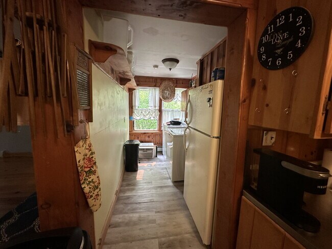 Building Photo - Charming 3BR Waterfront Retreat with Sunroom, Brick Accent & Scenic Lake Views