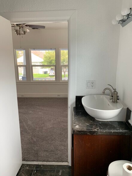 Middle bath to front bedroom - 3146 2nd Ave