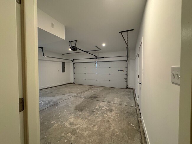 Building Photo - Vaulted Ceilings & Hardwood Floors in This Charming Indianapolis L