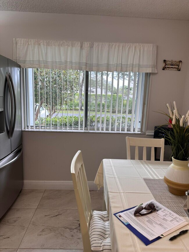 Building Photo - 6698 10th Ave N