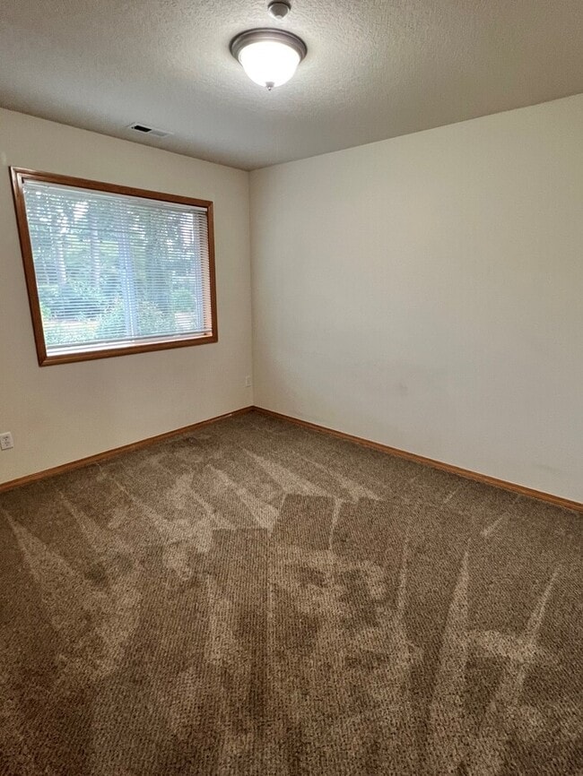 Building Photo - Beautiful Home with LVP Flooring, W/D, Garage, Back Yard, and MORE!