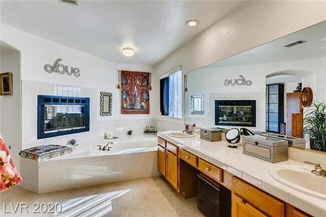 Building Photo - Vegas's Only Available Waterfront Rental ~ 4 Bedroom Desert Shores Lake Front Home