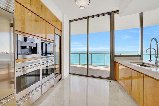 Building Photo - 9703 Collins Ave