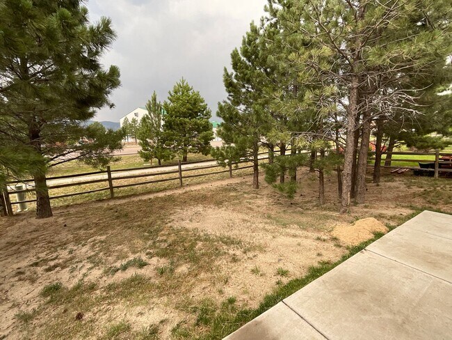 Building Photo - 4 Bedroom Home Available Near Woodmoor Dr ...