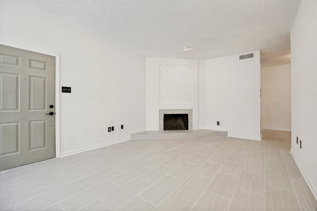 Building Photo - Spacious Dallas Condo with Unbeatable Storage, Private Patio & Carport