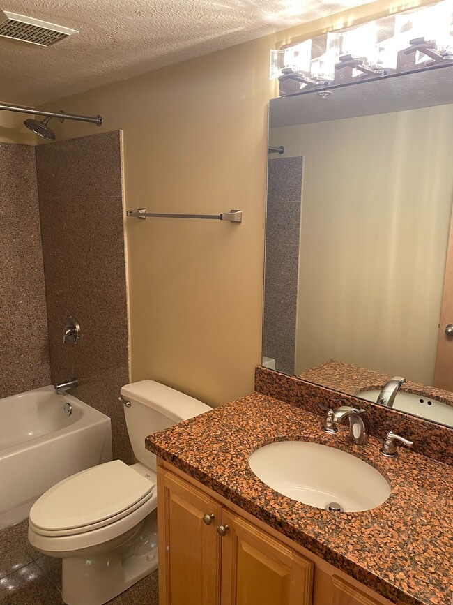 Second Bathroom with Custom Lighting, Granite Countertops and Marble Flooring - 2222 Detroit Ave