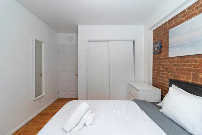 Building Photo - 309-311-311 E 95th St