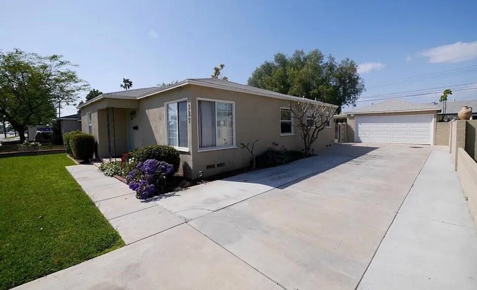 Front Door + Porch + Driveway + Garage - 327 E Collins Ave