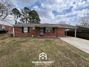 Building Photo - Spacious 4-Bedroom Memphis Home with Brick Fireplace & Fenced Backyard