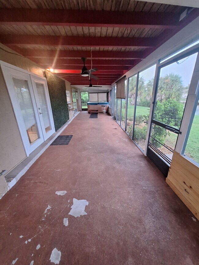 Building Photo - Gulf Access Home on Canal Available Now