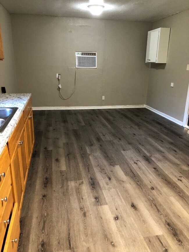 Building Photo - Nicely updated home with large kitchen and...