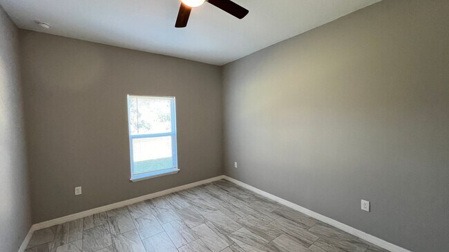 Building Photo - Beautiful 3 Bedroom Palm Bay Home with Upgrades & No Water Bill!
