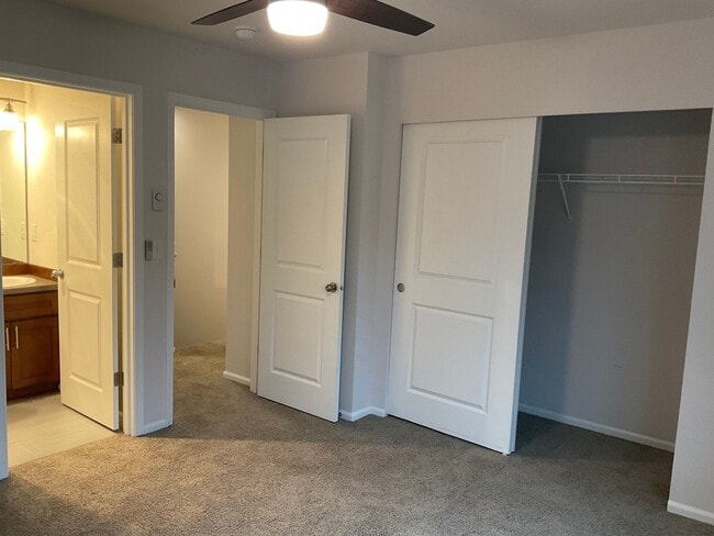 Building Photo - Riverfront Townhome with Tandem Garage & Fenced Yard