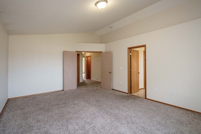 Building Photo - 3 bedroom 2.5 Bath - On Dead End Street - Low Maintenance Fenced Yard - Community Center with Swi...