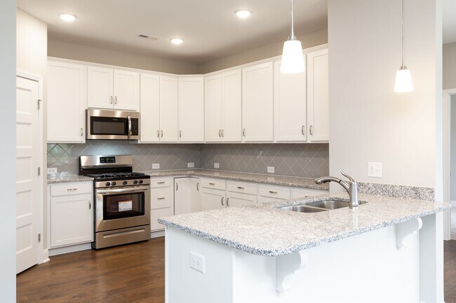 Building Photo - **BE THE LUCKY ONE TO LIVE IN THIS 2022-BUILT UPSCALE COTTAGE HOME IN THE PRESERVE AT BELLE POINTE**