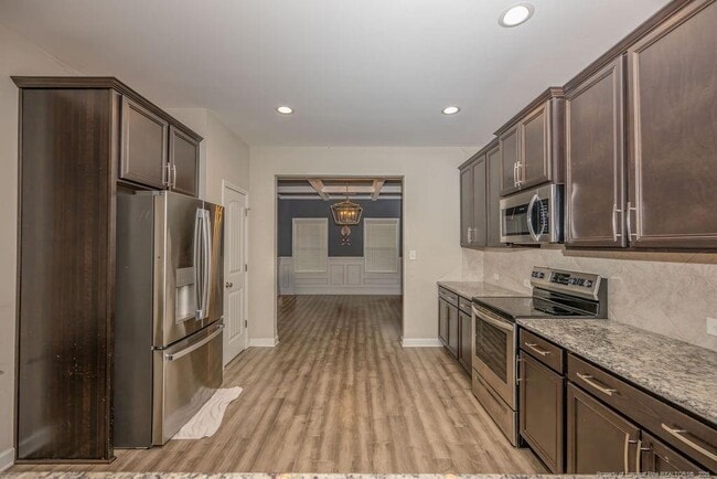 Building Photo - 6821 Hunters Den Rd