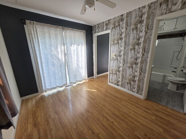 Building Photo - 2 Bedroom, 1 Bathroom West Hill Home with Fenced Yard, Garage, & Bonus Living Space