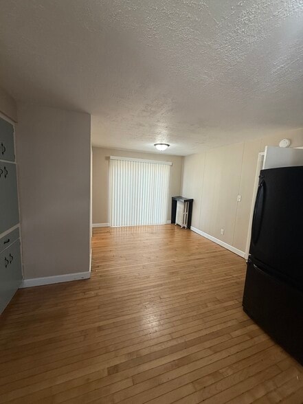 Dining Area with sliding door leading to small deck - 1001 N 8th St