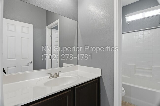 Building Photo - NW!! 4 Bedrooms!!! One Bedroom Down!!  Pool!!! Tankless Hot Water Heater!! Court yard at entrance...