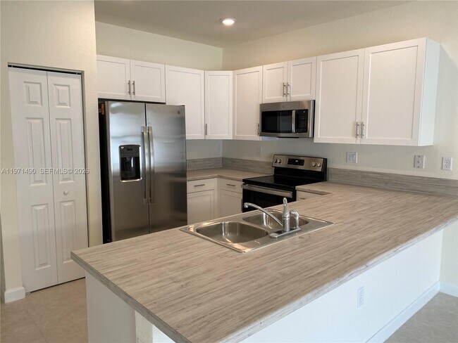 Building Photo - 11379 W 34th Wy.