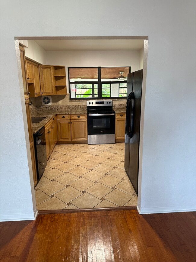 Kitchen with Granite Countertops - 44 SE 4th St