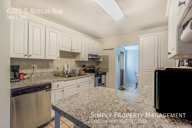 Building Photo - 6201 S Adelia Ave