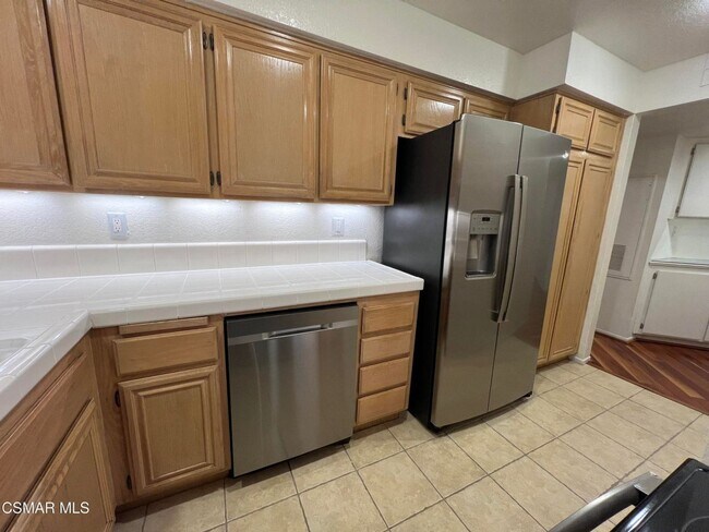 Building Photo - Welcome to this beautifully situated first-floor end unit