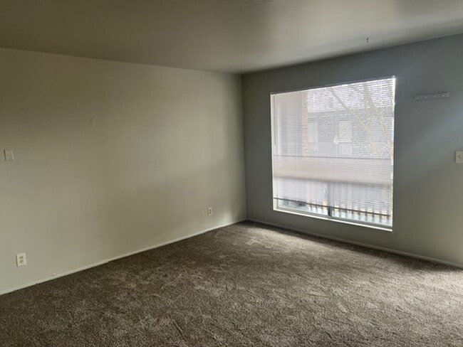 Building Photo - New carpet and paint throughout. Carport a...