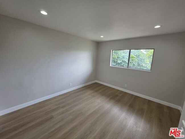 Building Photo - 14747 Woodruff Ave
