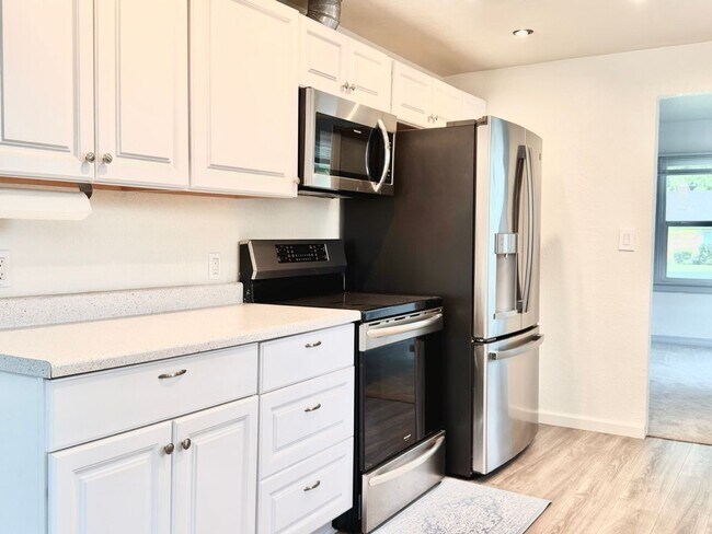 Building Photo - Charming Everett Home with Spacious Backyard, Garage, and Bonus Flex Spaces