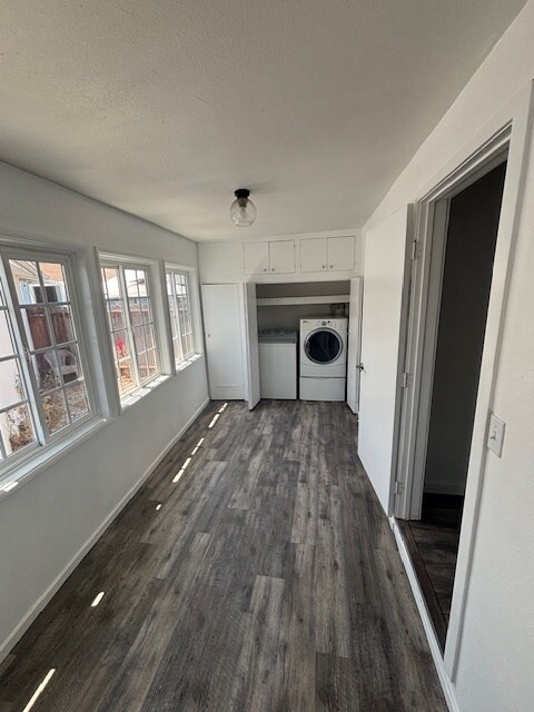 Back enclosed porch - washer and dryer hooked up and units included - 4156 W 161st St